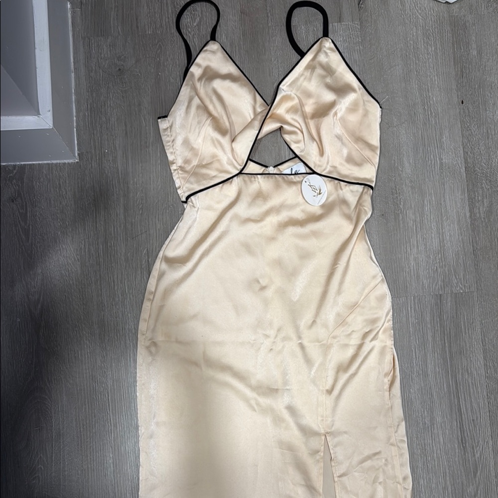 Elegant Cream Dress with Black Trim